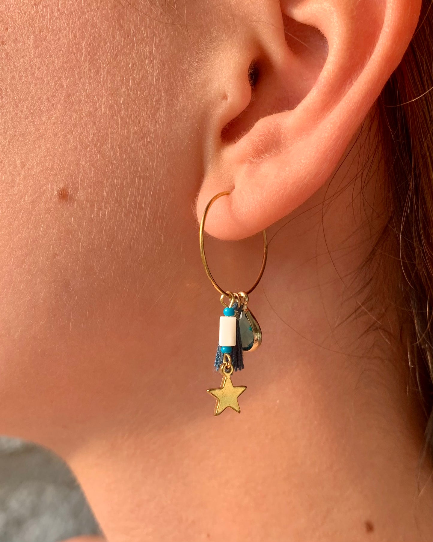 Aros charms turquesas